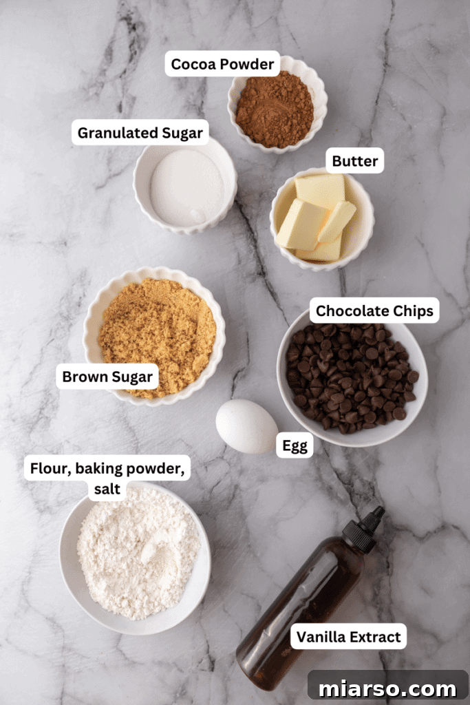 All ingredients for the brownie cookies laid out neatly on a kitchen counter.