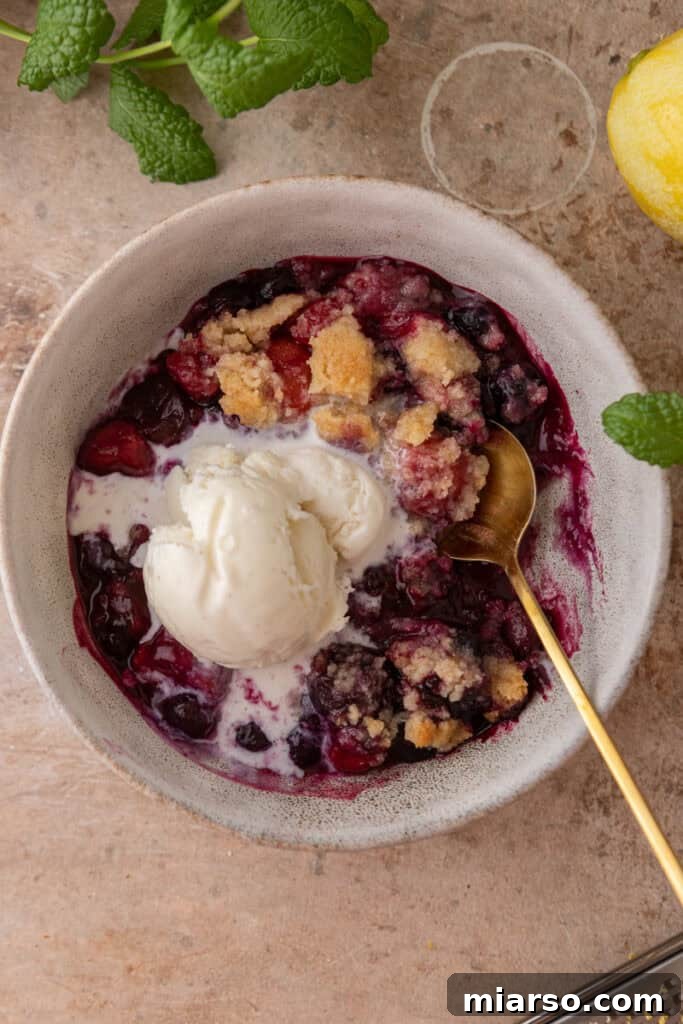 mixed berry cobbler recipe in a bowl