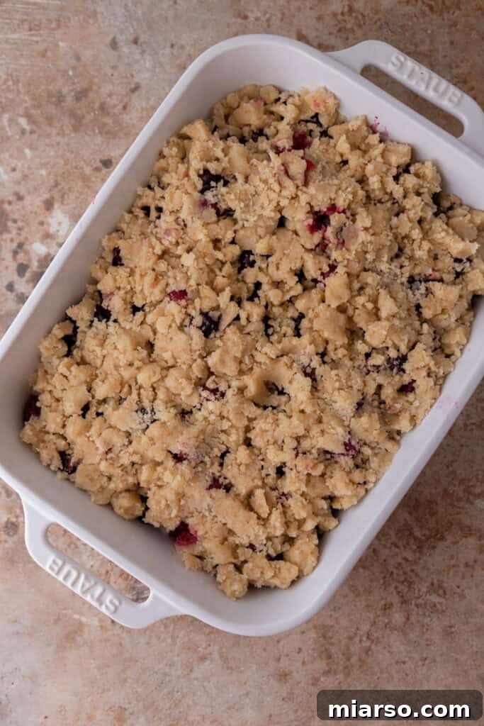 raw dough and mixed berry in a dish