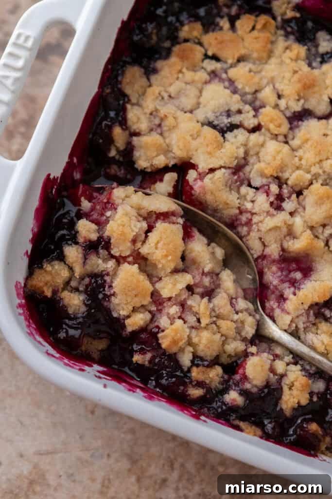 baked dough and mixed berry in a dish