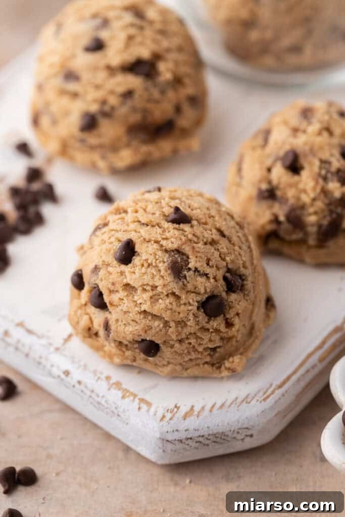 Perfect No Bake Chocolate Chip Cookie Dough 11 Cookie dough on a wooden board