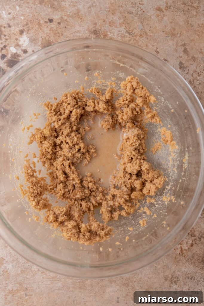 Perfect No Bake Chocolate Chip Cookie Dough 6 Wet ingredients in a bowl