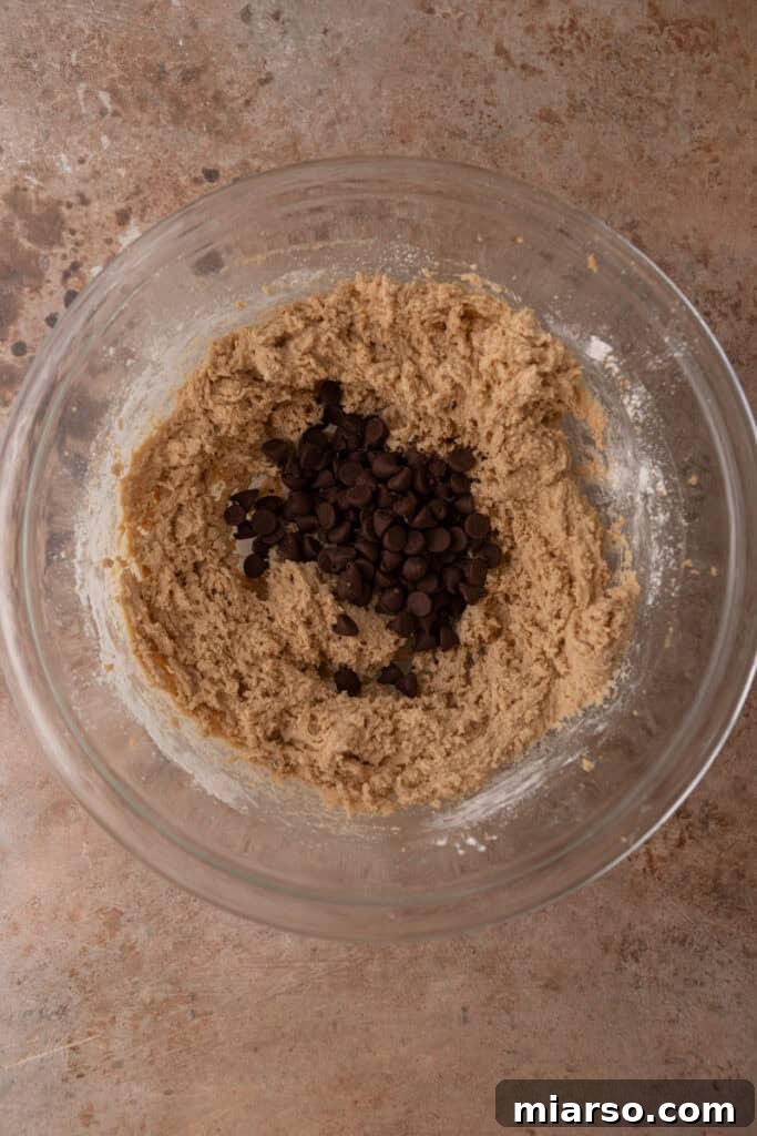 Perfect No Bake Chocolate Chip Cookie Dough 8 Cookie dough with chocolate chips in a bowl