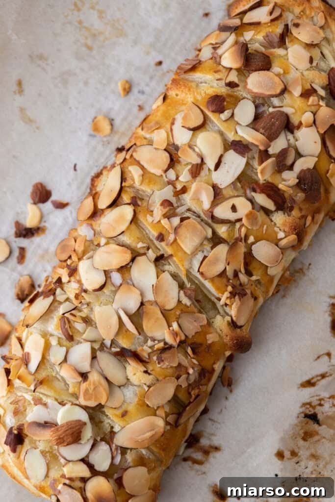 Baked braided almond croissant danish fresh from the oven