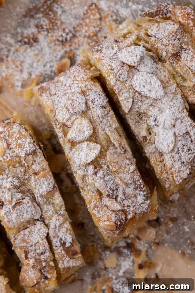 Overhead view of a whole Braided Almond Croissant Danish Recipe on a baking sheet
