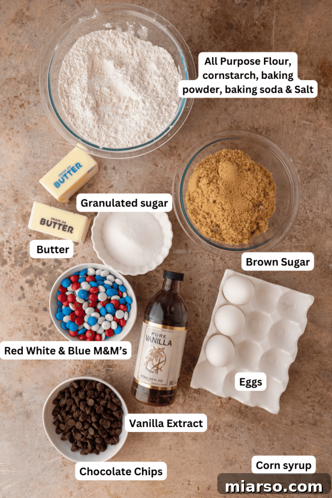 A collection of ingredients laid out on a kitchen counter, ready for making patriotic cookie bars.