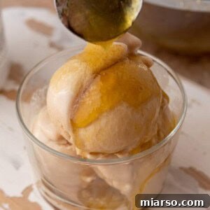 viral olive oil caramel recipe drizzled over ice cream
