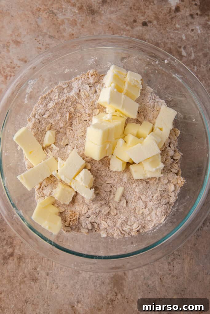Your New Favorite Strawberry Rhubarb Crisp 6 Cold cubed butter added to the dry topping ingredients.