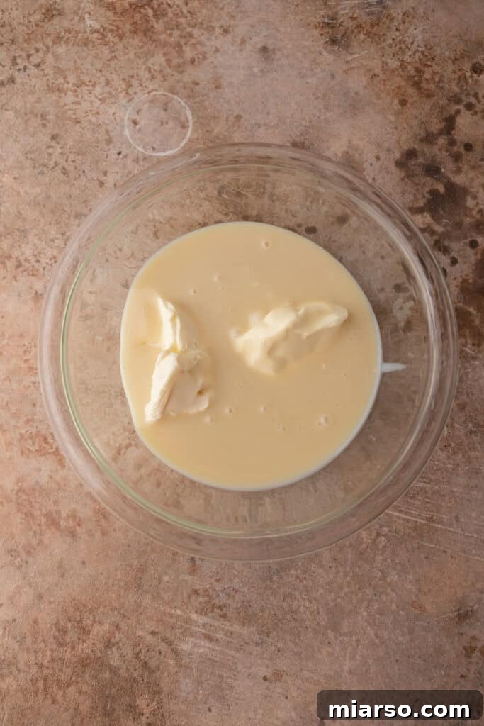 Effortless No-Churn Tiramisu Ice Cream 5 unmixed ingredients in a bowl