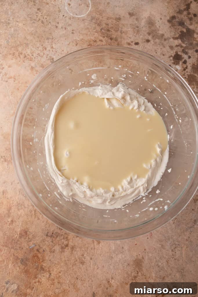 Effortless No-Churn Tiramisu Ice Cream 7 unmixed ingredients in a bowl