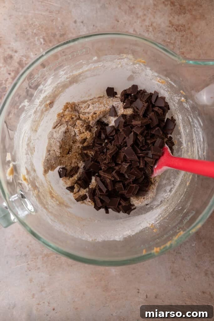 Chocolate chunks added into the cookie dough