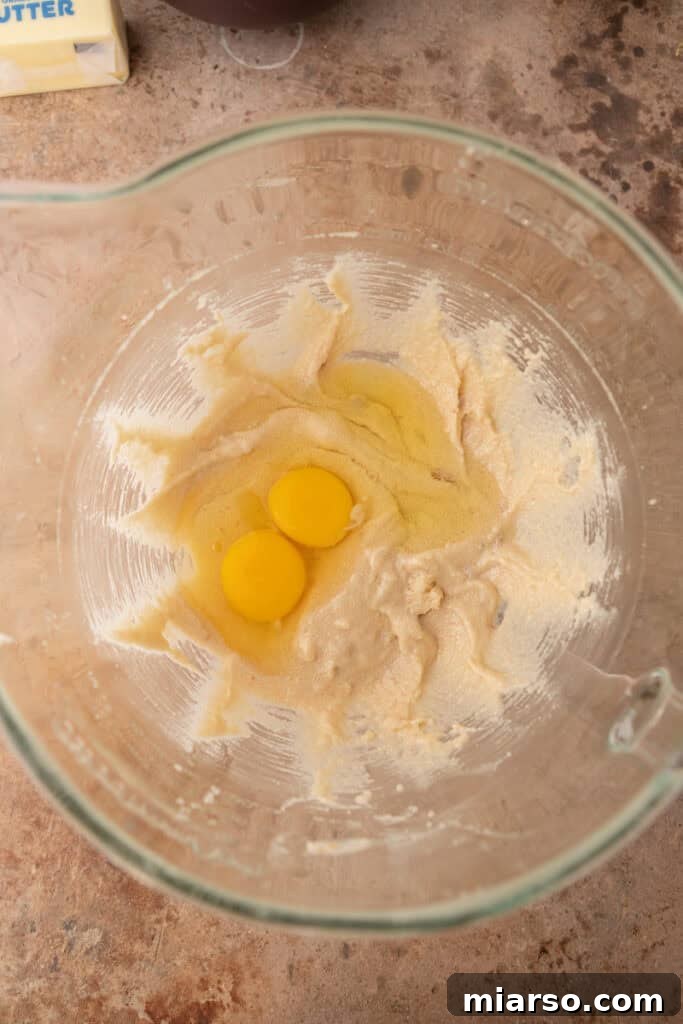 Simply Irresistible Banana Cake 6 Wet ingredients for banana cake in a separate bowl