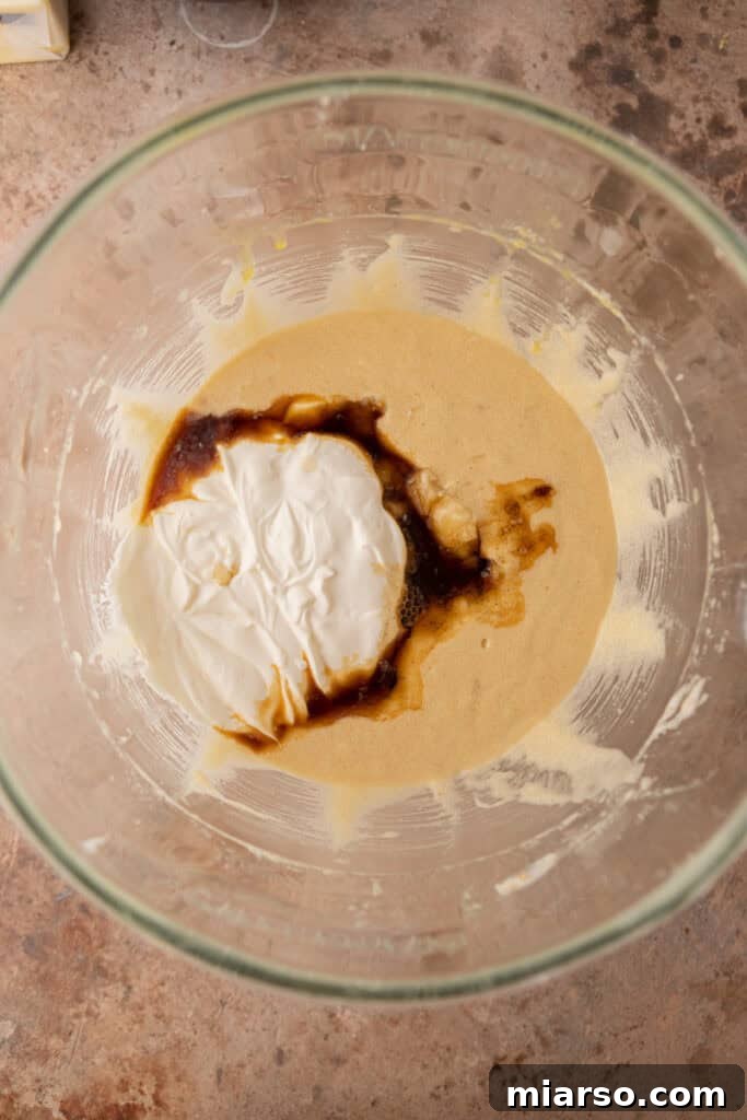 Simply Irresistible Banana Cake 7 Mixing dry and wet ingredients for banana cake batter