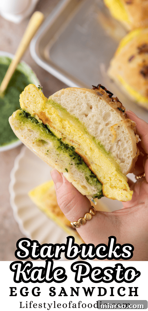 Pinterest pin showing the delicious Starbucks Egg Kale Pesto Mozzarella Sandwich copycat recipe, inviting users to save it.
