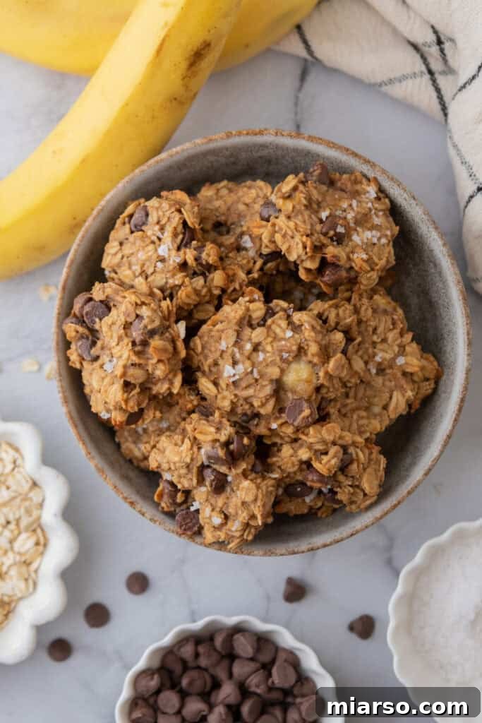 Wholesome Banana Oat Cookies 12 Overhead shot of the Healthy Oatmeal Banana Cookies recipe, arranged artfully