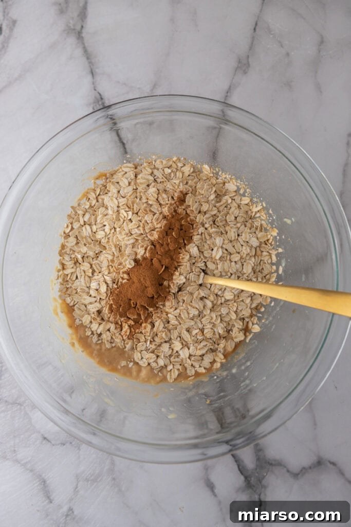 Wholesome Banana Oat Cookies 6 Unmixed ingredients in a bowl, before mashing