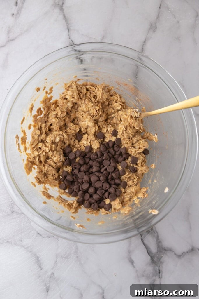 Wholesome Banana Oat Cookies 7 Mixed ingredients in a bowl, forming cookie dough