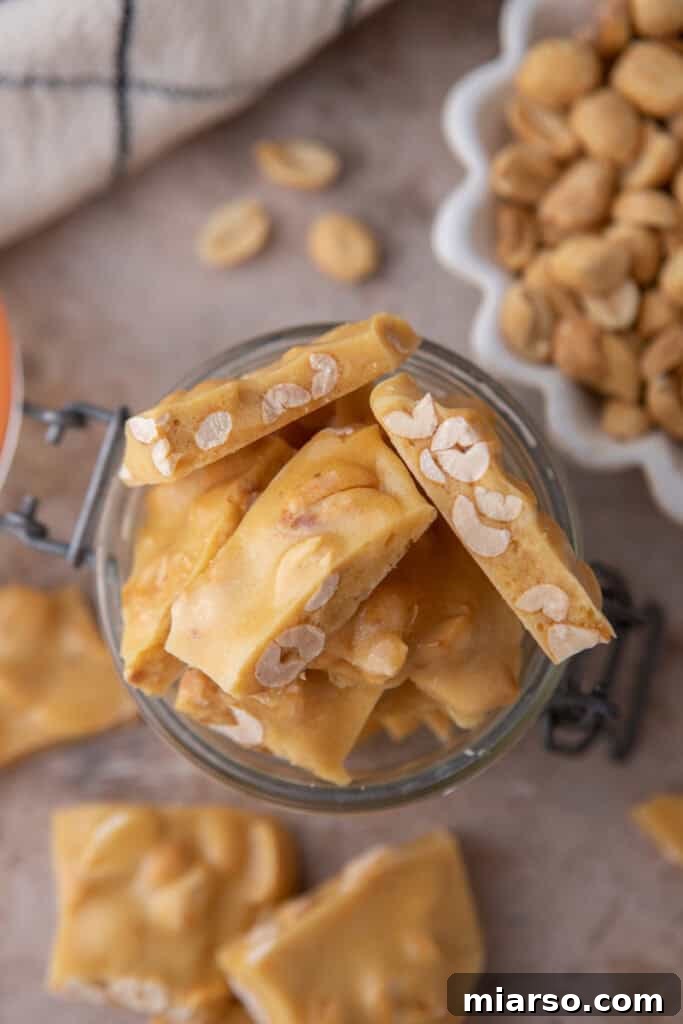 Overhead view of microwave peanut brittle, showcasing its beautiful golden color and crunchy texture.
