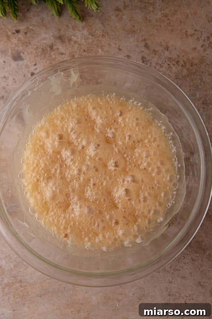 Peanut brittle mixture returning to the microwave for the second cooking interval.