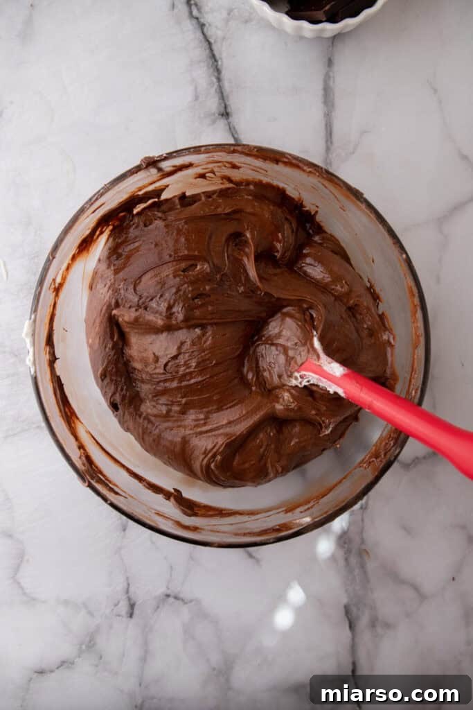 Effortless Three Musketeers Cool Whip Treats 7 Chocolate mousse-like mixture after folding Cool Whip into melted chocolate.