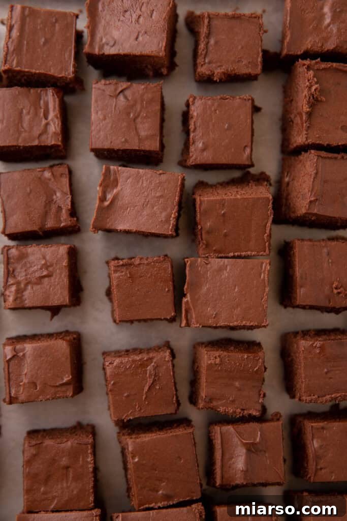 Effortless Three Musketeers Cool Whip Treats 9 Squares of chilled chocolate filling cut and ready for dipping.