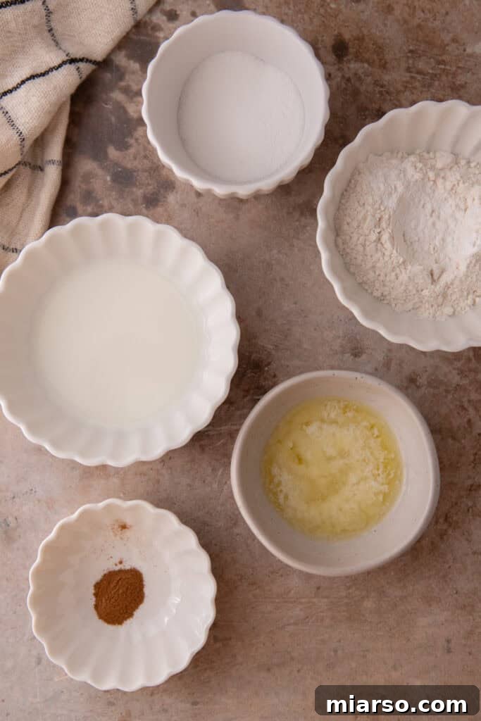 Ingredients for snickerdoodle mug cake recipe laid out on a table