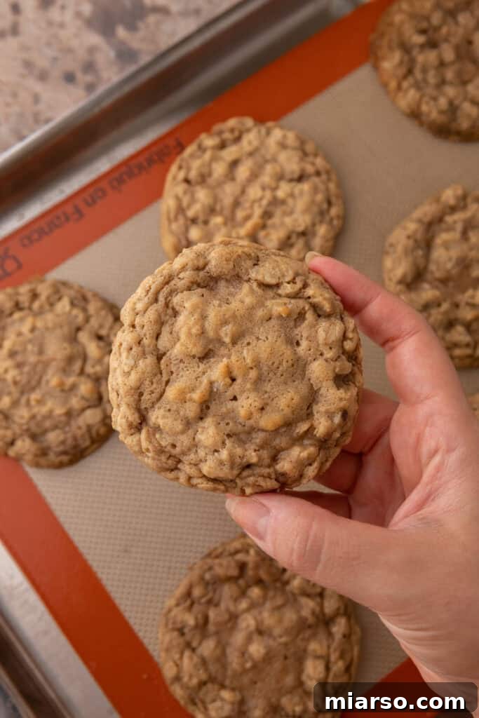Maple Glazed Oatmeal Cookies on a baking sheet