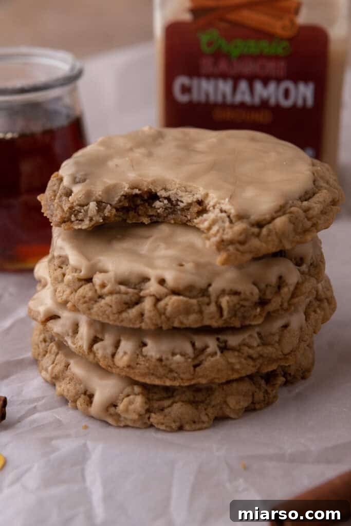 Maple Glazed Oatmeal Cookies stacked on top of each other