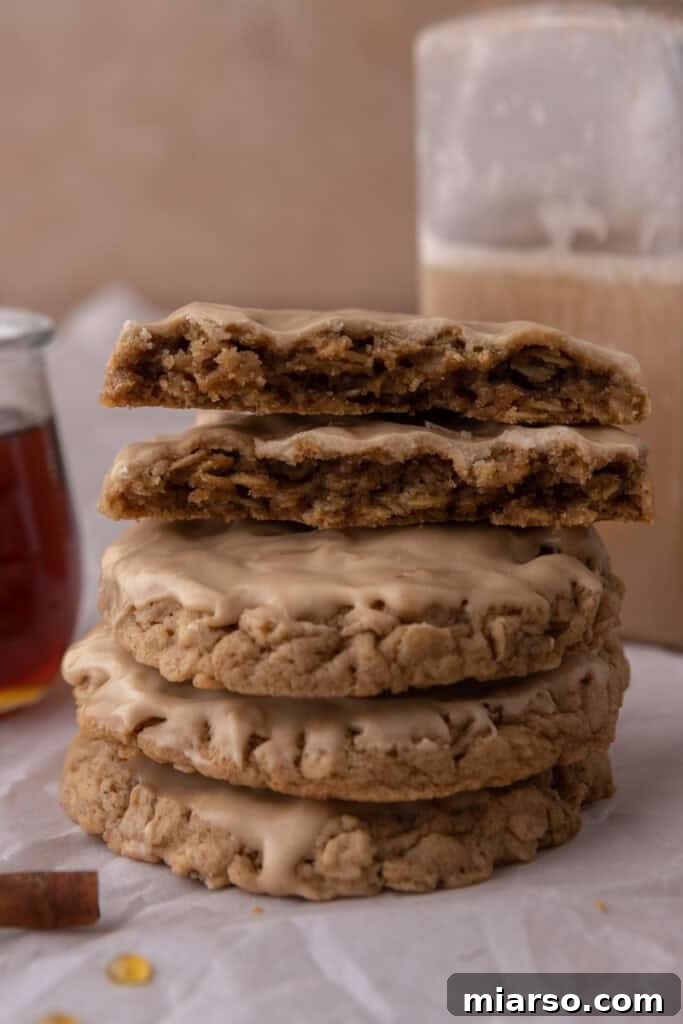Maple Glazed Oatmeal Cookies stacked on top of each other