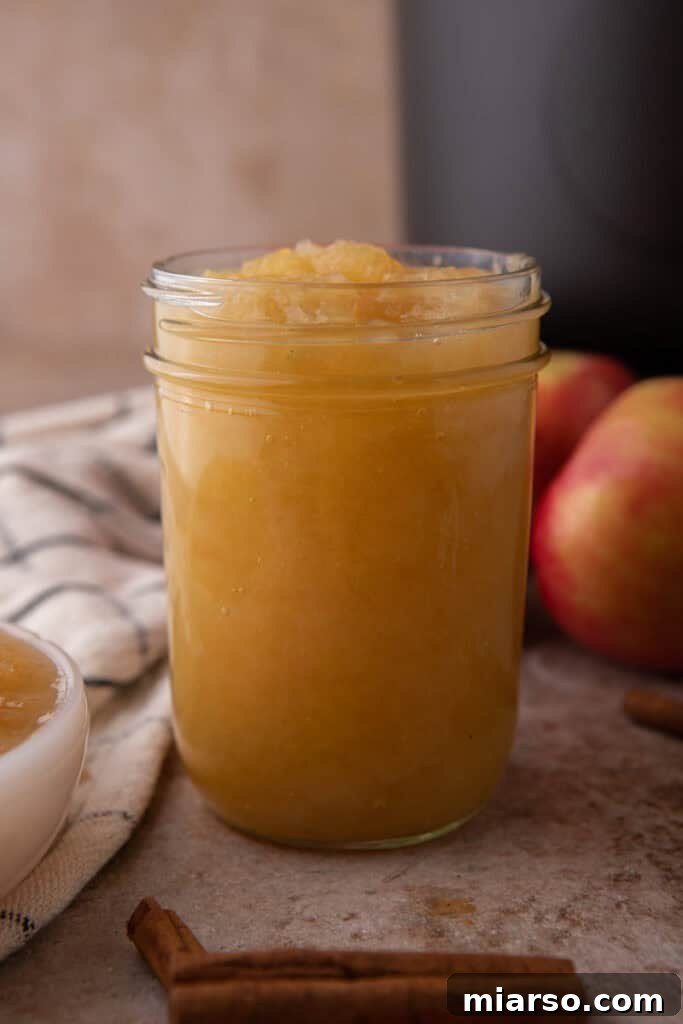 Effortless Instant Pot Applesauce Perfection 10 cooked fruit in a jar, ready for storage