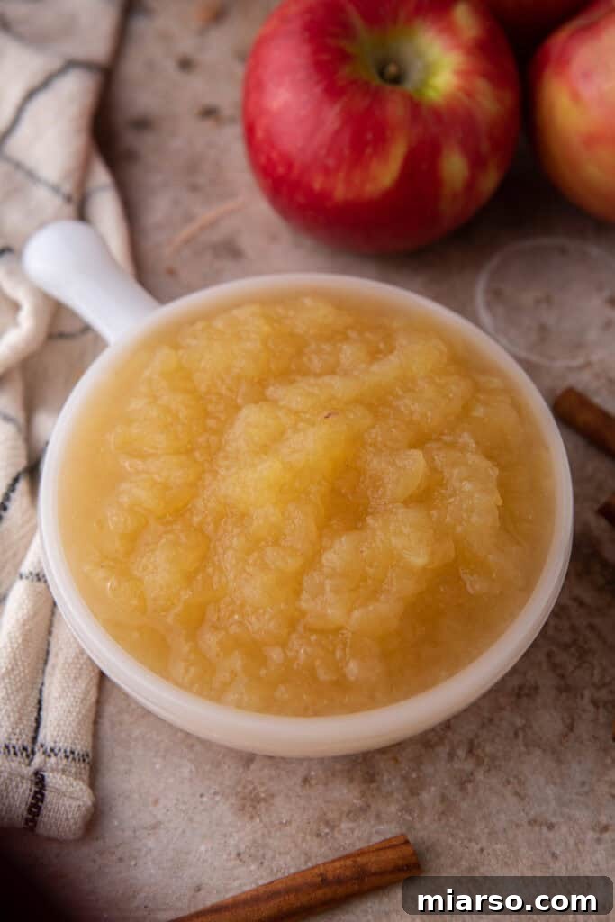 Effortless Instant Pot Applesauce Perfection 7 cooked fruit on a plate, mashed applesauce