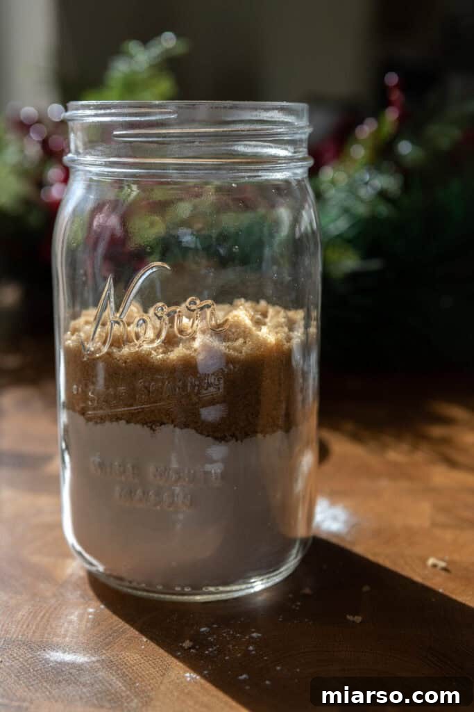 Adding brown sugar layers to the cookie mix jar