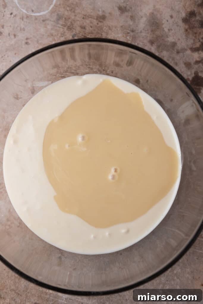 Effortless Microwave Peanut Butter Fudge 5 Initial ingredients in a bowl before mixing for peanut butter fudge.