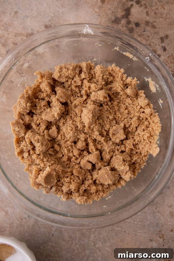 Wet ingredients for the pumpkin coffee cake batter, whisked until smooth and creamy.