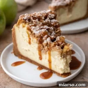 apple crisp cheesecake recipe slice with caramel on top