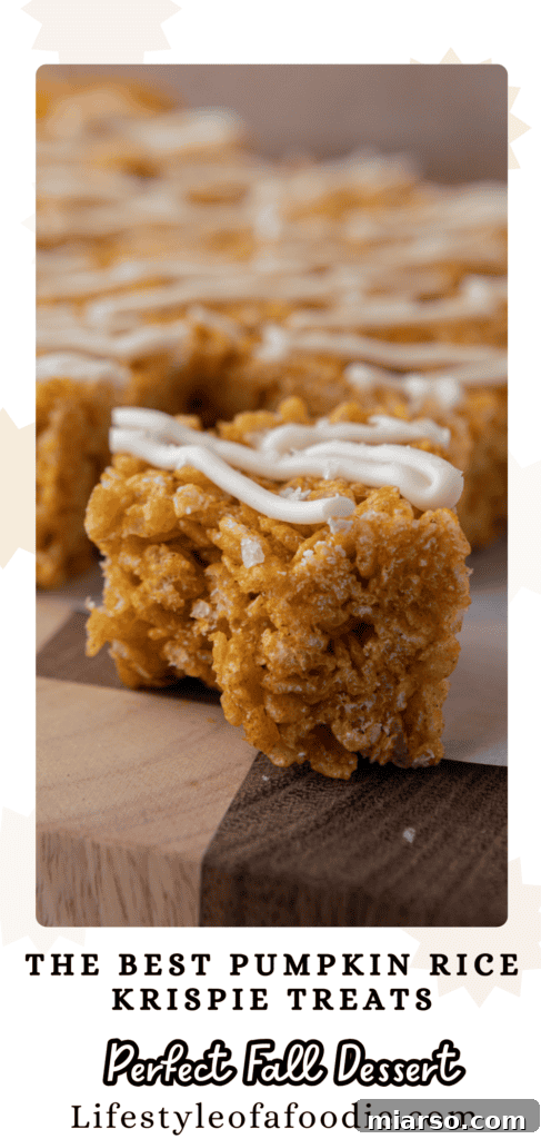Artful arrangement of Pumpkin Rice Krispie Treats on a festive autumn background.