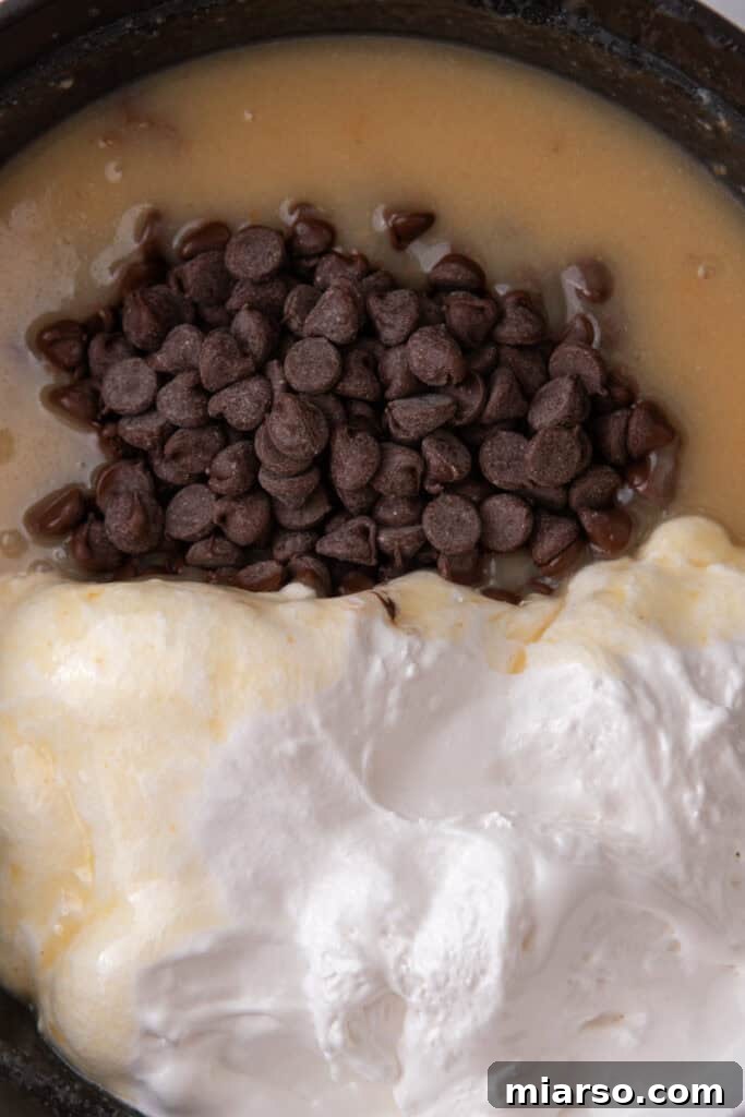 sugar, evaporated milk, and butter combined in a pot, ready to be heated for the fudge recipe