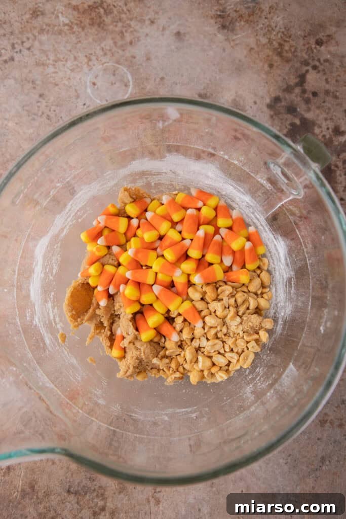 Wet ingredients combined in a mixer bowl.