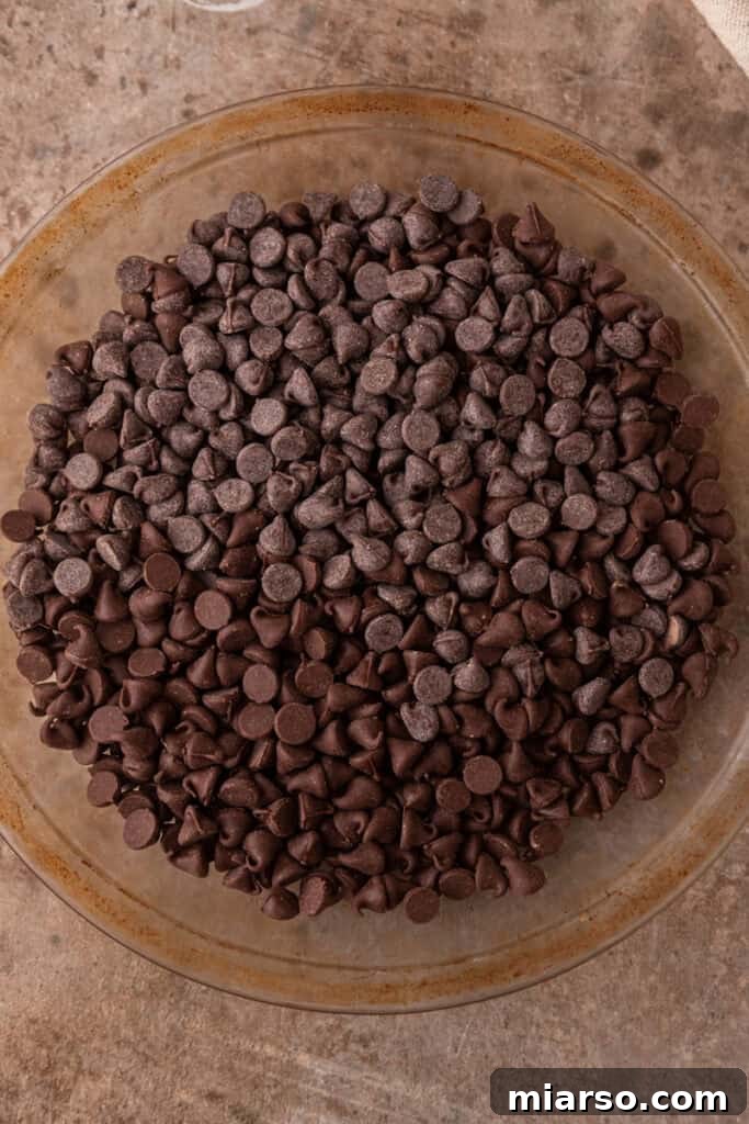 Bewitching Halloween S'mores Dip 5 chocolate chips in a baking dish