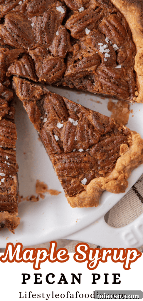 Another enticing Pinterest pin image showcasing a whole maple pecan pie, emphasizing its golden-brown topping and perfect holiday appeal, inviting users to pin this recipe.