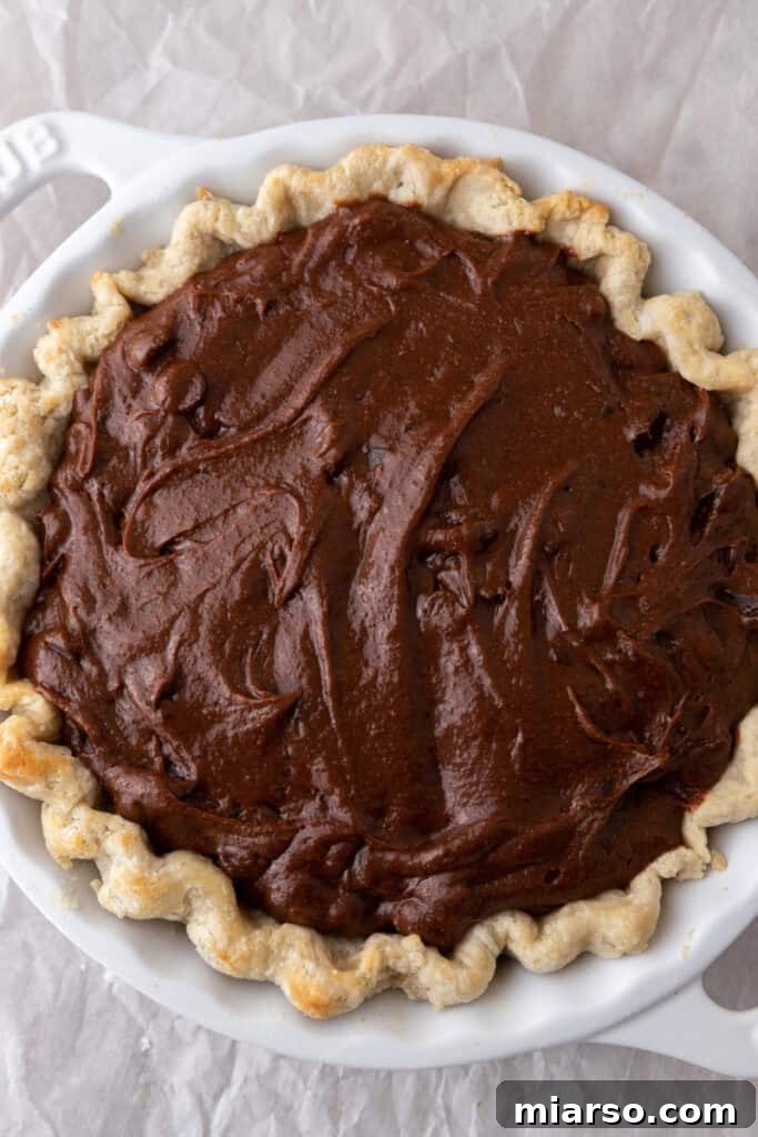 Ultimate Fudgy Brownie Pie 9 batter in a crust