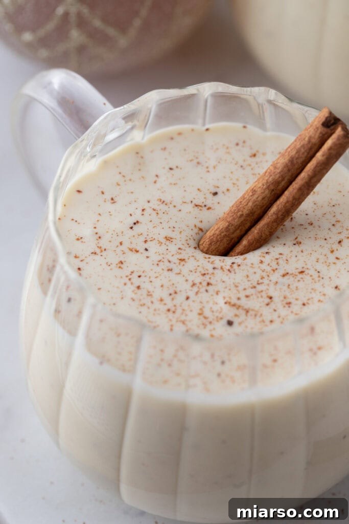 Craft Your Own Creamy Holiday Eggnog 12 homemade eggnog recipe in a glass overhead shot