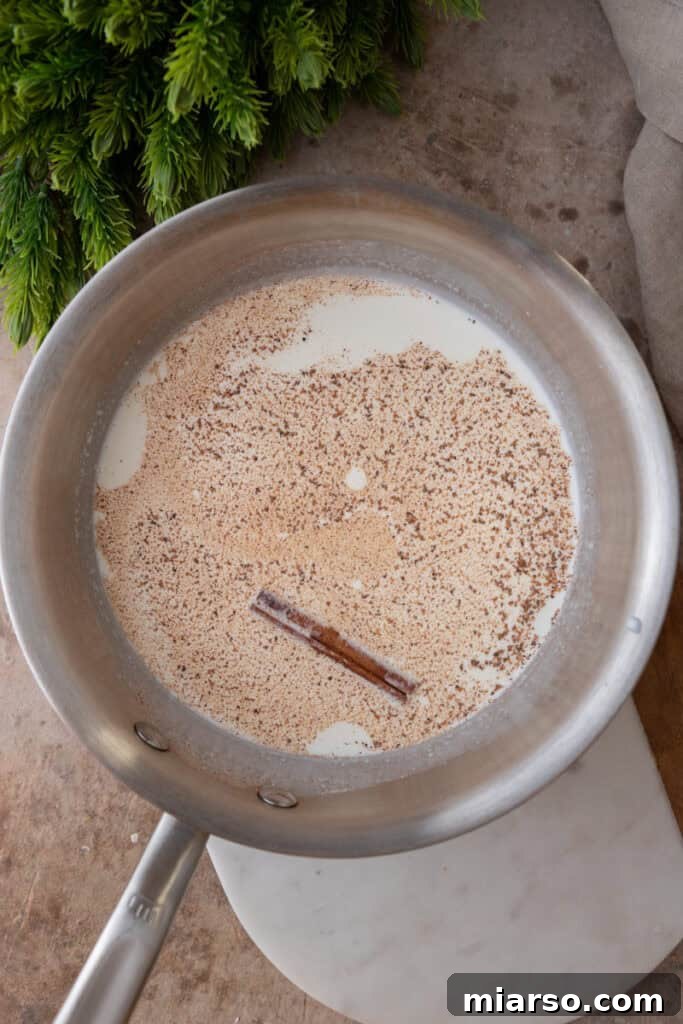 Craft Your Own Creamy Holiday Eggnog 7 unmixed ingredients in a pot