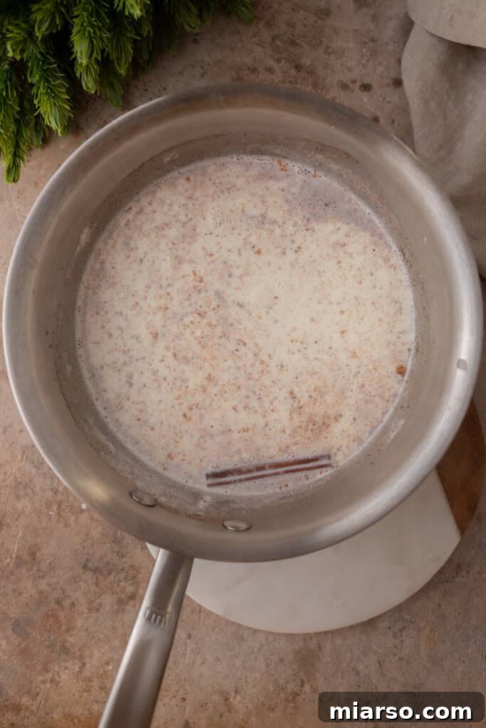 Craft Your Own Creamy Holiday Eggnog 8 mixed ingredients in a pot