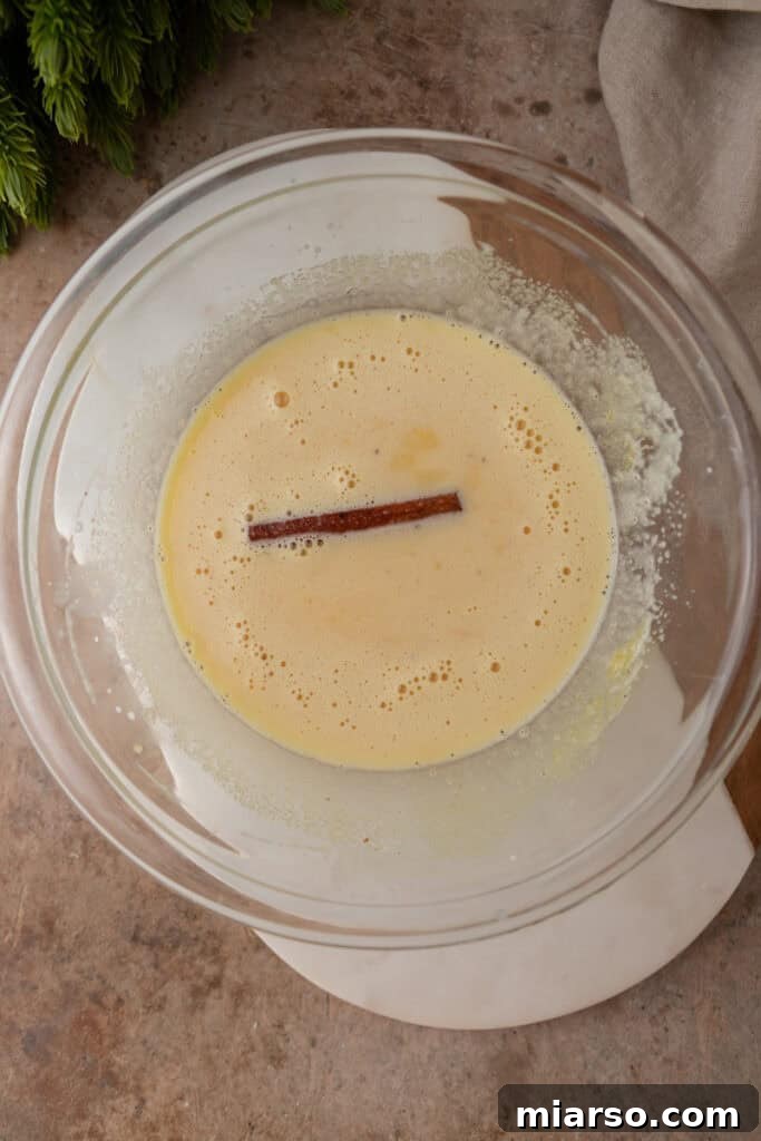Craft Your Own Creamy Holiday Eggnog 9 mixed ingredients in a bowl