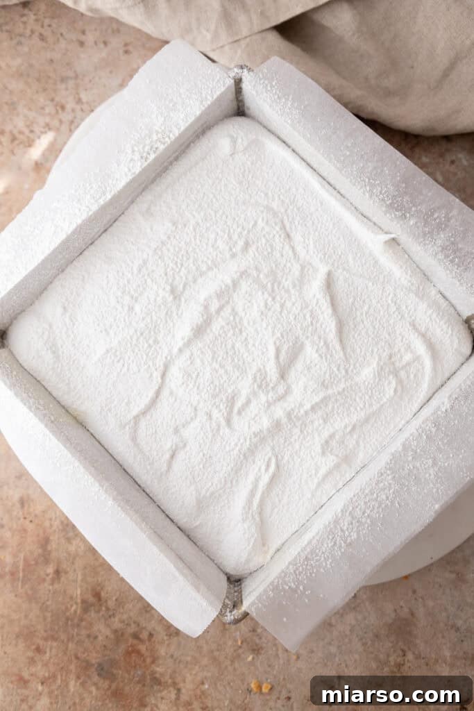 marshmallow mixture resting in a pan, setting up