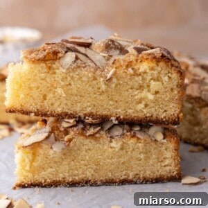 two slices of the almond cake recipe stacked on each other