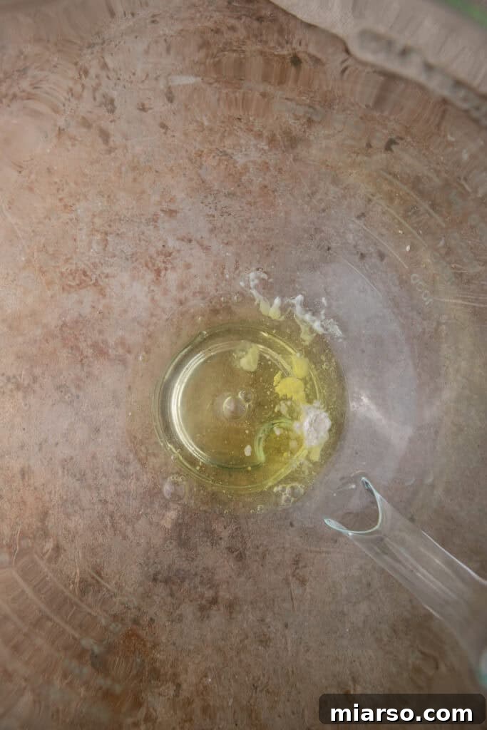 unmixed egg whites in a bowl