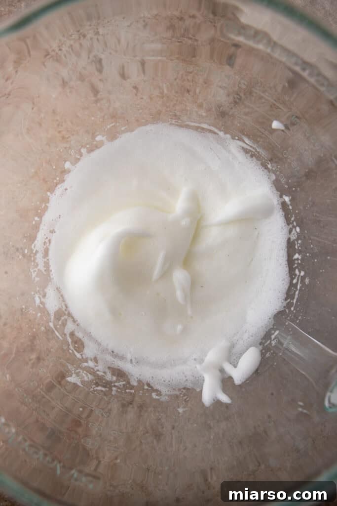 mixed egg whites in a bowl