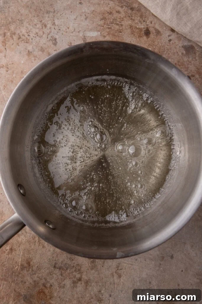 mixed sugar and corn syrup in a saucepan